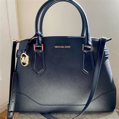 difference between michael kors and michael kors collection|michael kors new handbag collection.